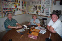 Club Members tying salt water flies prior to the trip