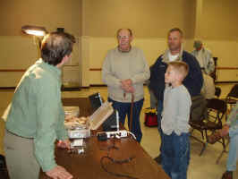 Jack Dennis Talking with Club Members during a break in the Fly Tying Demonstration